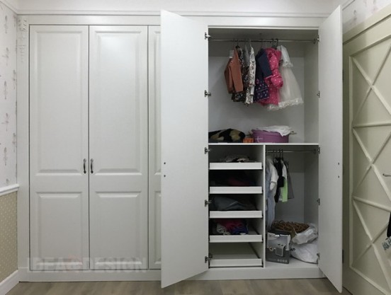 Closet in the children's room in classic style