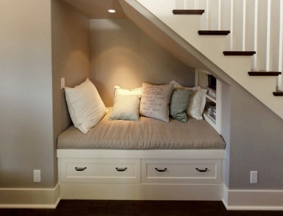 Built-in sofa under the stairs